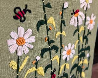 Large vintage crewel artwork.