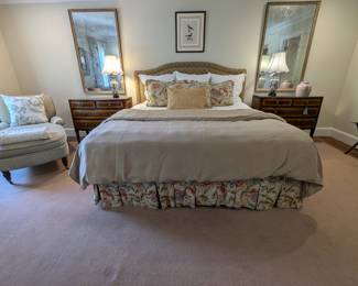 Master bedroom king sized bed, w/upholstered headboard, custom soft floral bed linens and dust ruffle, handsome pair of four drawer banded mahogany chests, pair of vintage two-piece mirrors, with antiqued glass, pair of white cloisonne table lamps, w/shades, finials, pair of Asian red/white ginger jars, nicely framed/matted bird print and custom-ordered chenille chaise lounge, by Lee Jofa.