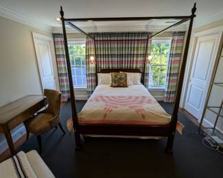 Nice queen size mahogany canopy bed, by Henkel Harris, antique cotton quilt and bed pillow, by Brunschwig and Fils.