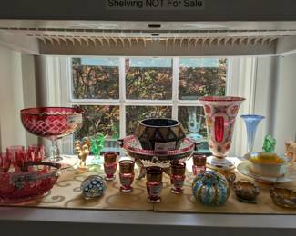 Wonderful collection of vintage colored glass pieces, including a Tiffany trumpet vase and Steuben gold aurene calcite bowl and underplate, by Frederick Carder, England.
