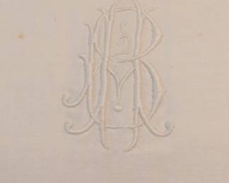 This bed has some special European linens, these pillow shams are French and have very nice monograms.