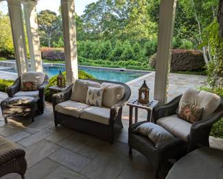 Nice set of outdoor Wonder Wicker sofa and pair of matching armchairs, w/ottomans, pair of teak side tables and wood/glass candleholders. Nice pool huh?
This is where we sit, have our daily lunch and talk about you.