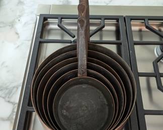 Nested set/6 vintage European copper pots, graduated from 13 - 23 cm.