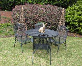 Nice set of wrought iron outdoor furniture, w/table and four matching armchairs, pair of woven root tuteurs and hoppy bunny.