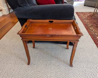 Vintage Maitland-Smith heraldic-embossed leather side table.