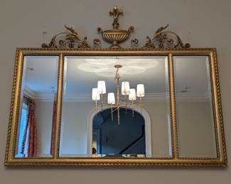 Vintage Italian LaBarge beveled glass triptych wall mirror, w/rope detailing and gilt wood urn crest, measures 52"w x 43.5"h.