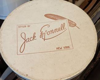 Yessir! We HAVE the collectible hats as well. FANTASTIC collection of highly sought-after Jack McConnell (1916-2007) Red Feather edition hats. If you are unfamiliar with amazing millinery, check out Jack's history for producing hats for the NYC/CA American royalty. He was THE go-to person for Hollywood starlets and NYC glamorpusses, glamorpussi? ;-) After years of attending the Kentucky Derby (May) and the Royal Ascot horse racing events (June) the house diva has decided to part with some of her most flamboyant headwear - lucky you!! This is the earliest style of hat boxes that Jack McConnell used for his confections - just this box is quite the collectors item.