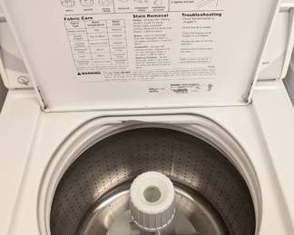 Stainless steel interior of the Speed Queen washer.