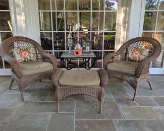 Pair of Wonder Wicker armchairs with comfy cushions, matching ottoman, wrought iron/tile-topped table, with brass outdoor light, candleholder and birdhouse, made out of a GA license plate.