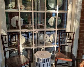 Pair of fruitwood resin Chiavari stackable side chairs and garden stool, from Ballard Designs.