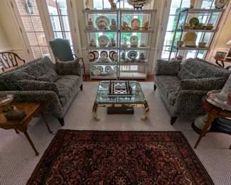 Nice pair of custom-designed sofas, from Ainsworth Noah, with Brunschwig and Fils fabric, vintage Mastercraft brass coffee table, w/beveled glass and Ming legs, nice hand-woven Persian Bakhtiari rug, measures 4' 6" x 5' 7", nice selection of china sets.