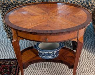 Louis Philippe oval table, w/marquetry and inlay, single drawer and bottom shelf, ca. 1850, from William Word Antiques.