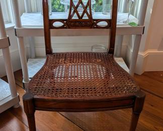 One of the carved wood side chairs, w/o custom seat cushion.