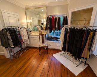 Clothing department, in the second floor primary bedroom bathroom, including women's blouses, pants, suits, skirts, pants, etc., mostly sizes 4-8. Labels include: Large clothing department, in the primary bedroom bathroom, including women's blouses, pants, suits, skirts, sweaters, pants, outerwear, etc., mostly sizes 4-8, shoes and boots size 8 1/2, purses, scarves. Clothing labels include: St. John, St. John Sport, Escada, J. Peterman, Carolina Herrera, Lily Pulitzer, Diane Von Furstenberg, Sara Roka, alice & olivia, Elie Tahari, Shoshanna, nanette lepore, Rachel, by Rachel Roy, Paule Ka, Valentino, Peserico, Lafayette 148, Southcott, Eva Franco, Frank & Eileen, Akris Punto, Halsbrook, Mara Hoffman, etc.