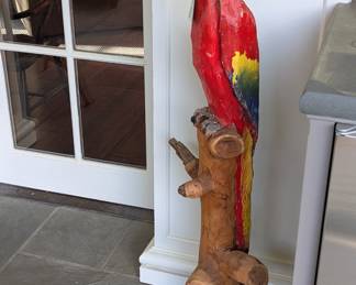 Custom-made scarlet macaw, by a FL chainsaw artist.