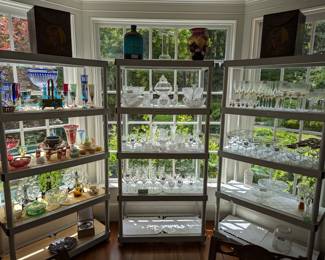 Quaint breakfast nook, with several sets of good stemware, vintage colored glass, ABCG, etc.