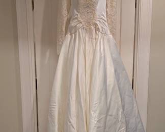 We even have the client's wedding dress and veil for sale, of course it was custom made, with hand-sewn pearls on the bodice