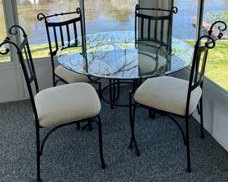 Black Wrought Patio Table with Glass Top and 4 Black Wrought Iron Chairs
