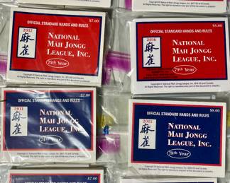 National Mah Jongg League Official Standard Hands and Rules books. Each year has a set of 4. 2009 through 2014