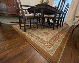 mama estate sale dark rug