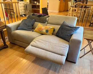 Sofa turns into recliners