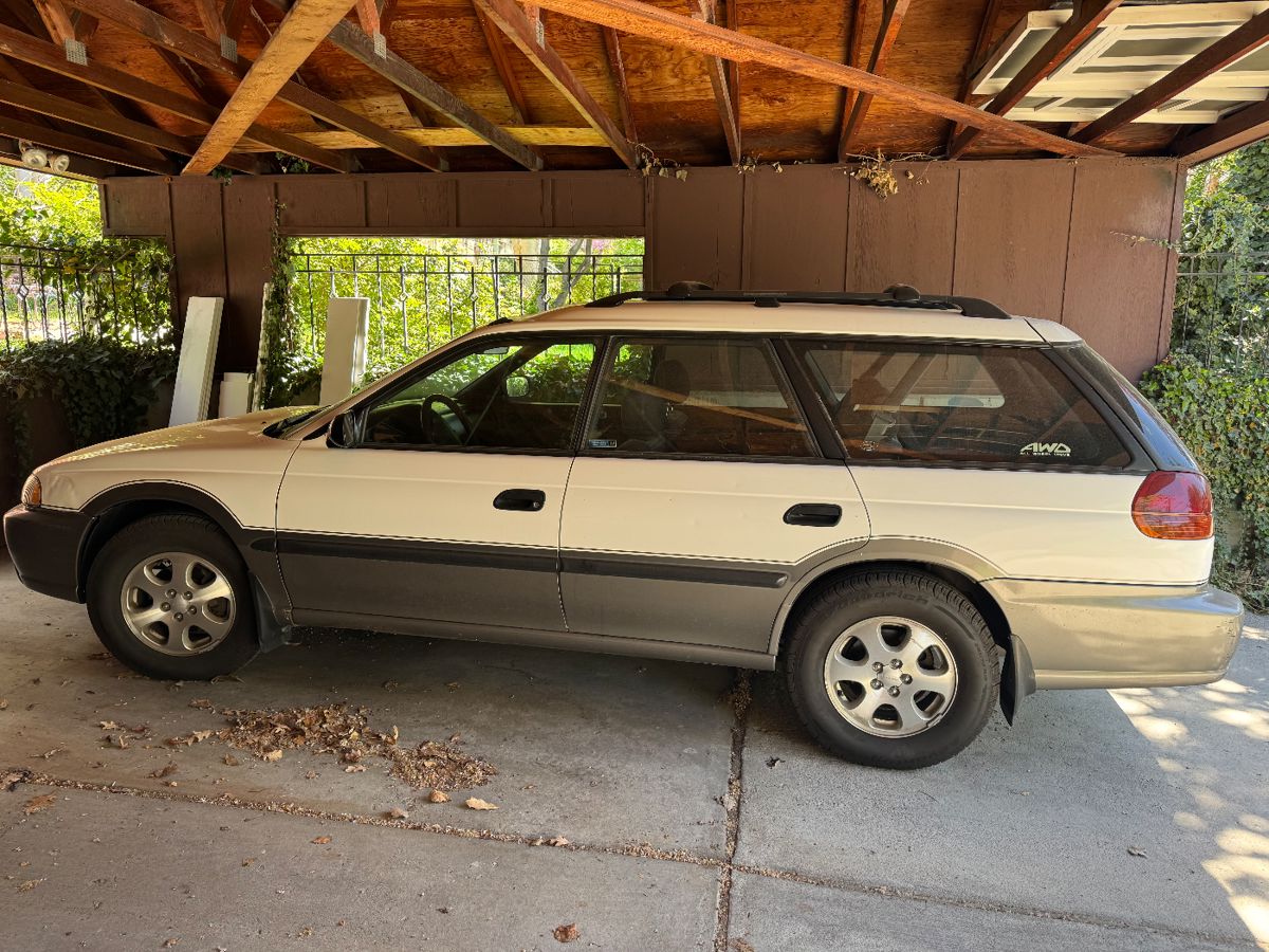 Clean 1997 Subaru Legacy with only  95,000 miles. Runs great! 