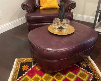 Wine leather chair and Kilim rug
