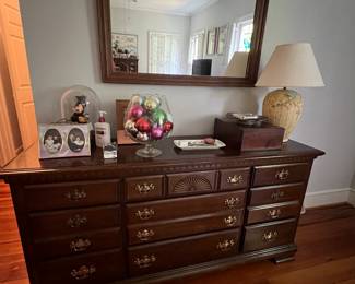 Cherry dresser. It does have a mountable mirror, the mirror was stored so not pictured with dresser.
