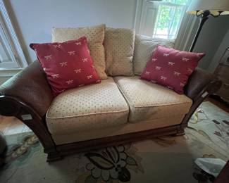 Loveseat with reversible cushions.