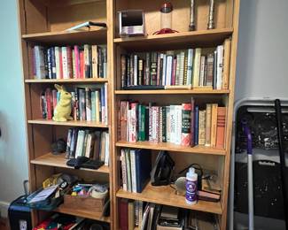 Lots of books and solid wood bookcases.