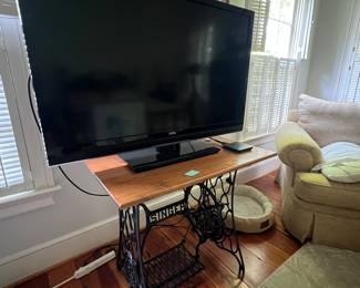 Sewing machine table
Flat screen TV