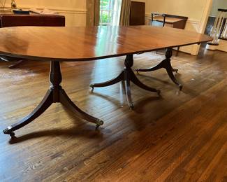 Antique 3- pedestal dining room table with2- leaves seat up to 14