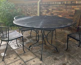 Wrought iron patio table and 4 chairs