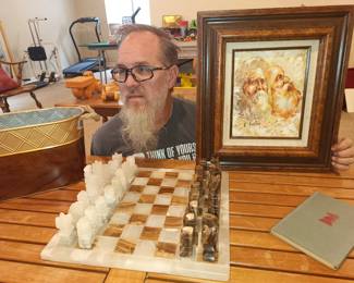 3 bearded men ready to battle you at chess