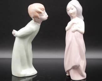 Retired Lladro Boy Blowing Kiss & Zaphir Girl Figurines