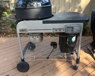 Weber freestanding charcoal grill with touch and go ignition black