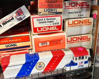 Lots of Lionel cars in boxes