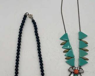 Lot 341 | Costume Jewelry Necklaces, Cinnabar, Resin