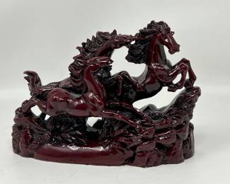 Lot 218 | Chinese Red Cast Resin Galloping Horses Figurine