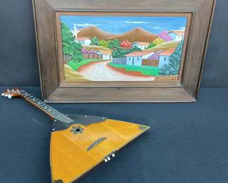 Russian Stringed Instrument And Handmade Terra Cotta Art From Honduras