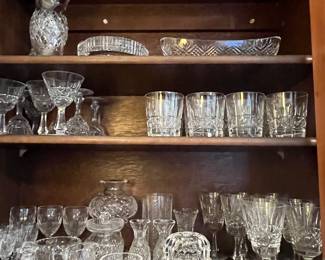 Several pieces of Waterford - stemware, vases, candle holders, trinket dishes
