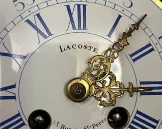 antique French bronze wall clock with enamel face - Lacoste, 43 Rue des St. Peres, Paris