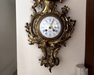 antique French bronze wall clock with enamel face - Lacoste, 43 Rue des St. Peres, Paris