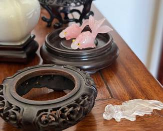 carved goldfish and wood stands