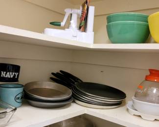 Pyrex mixing bowls, flat skillets, baking pans, zoodle maker