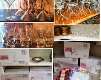 Dozens and dozens of bar glasses: martini, wine, beer, tumblers