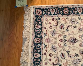 wool hand knotted runner, 29" x 10', cream with dark green border, has matching 8x10' rug