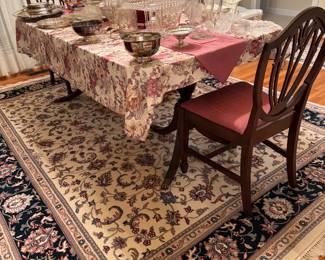 Wool handknotted rug and dining room suite