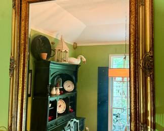 Elaborately Framed Wall Mirror