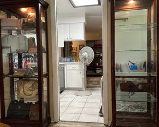 2 curio cabinets